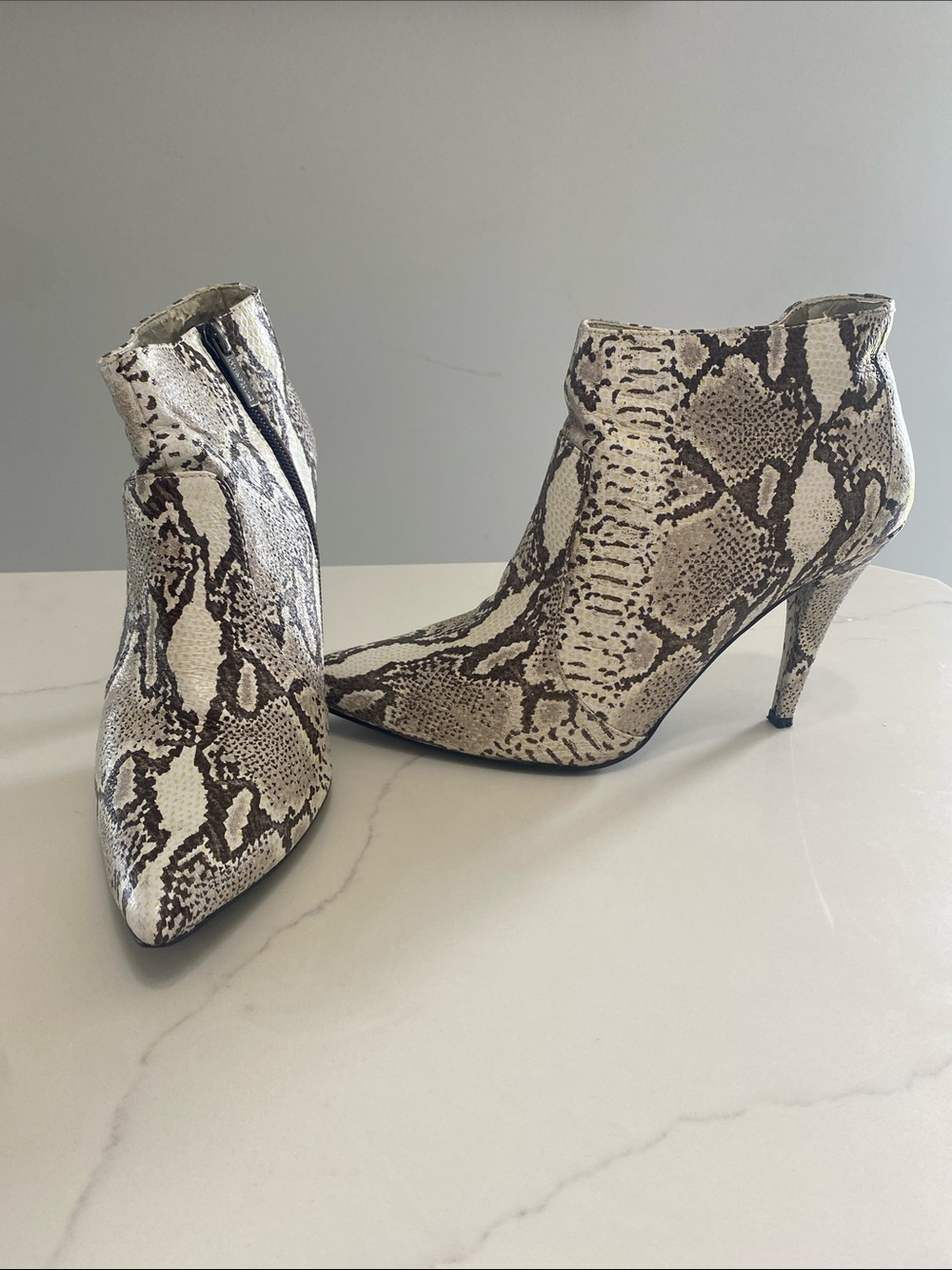 Colin Stuart Snake-Print Pointed Ankle Booties in Cream and Brown